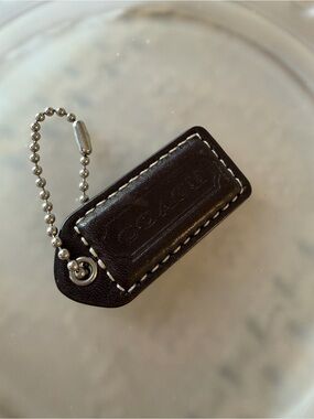 Coach Dark Brown Hang Tag Leather Fob Stitched with Silver Ball Chain